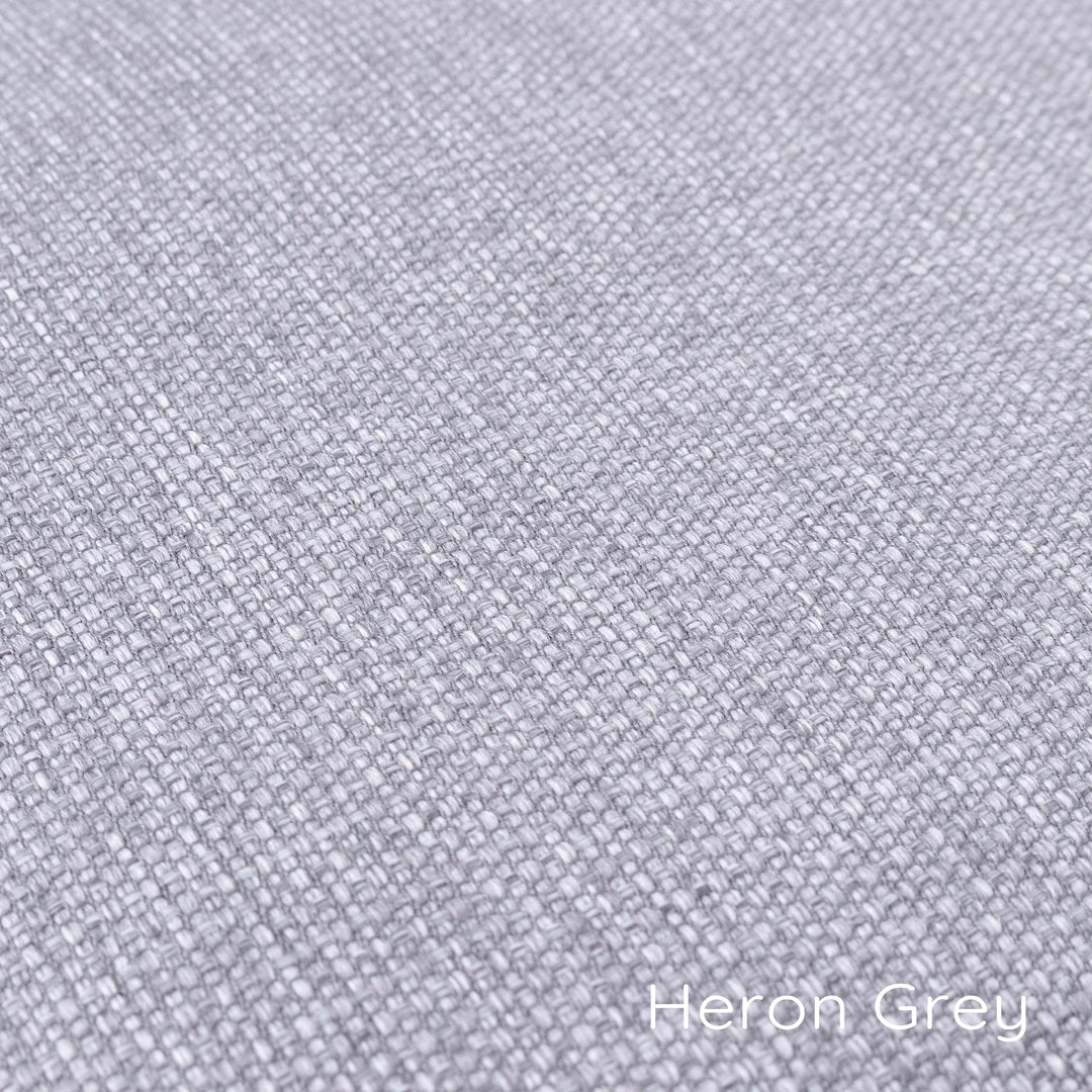 Detail of luxury dog bed fabric in Weave II, a luxury upholstery fabric that stain-resistant , wear-resistant and pluck-resistant, and machine washable too. Colourway is Heron Grey,  cool neutral grey.
