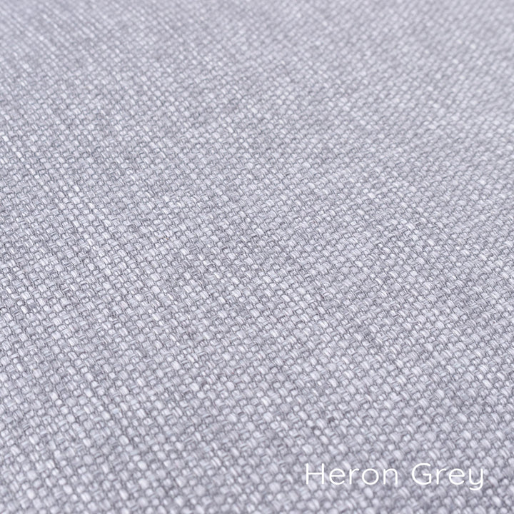 Detail of luxury dog bed fabric in Weave II, a luxury upholstery fabric that stain-resistant , wear-resistant and pluck-resistant, and machine washable too. Colourway is Heron Grey,  cool neutral grey.