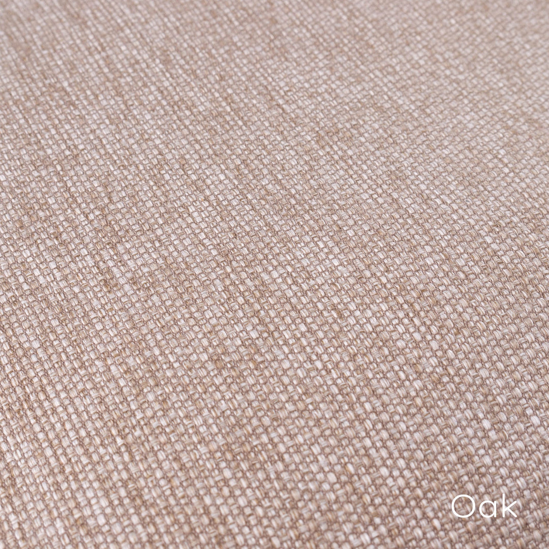 Close up detail of a woven upholstery fabric called Weave II in a mid caramel beige colour called Oak.