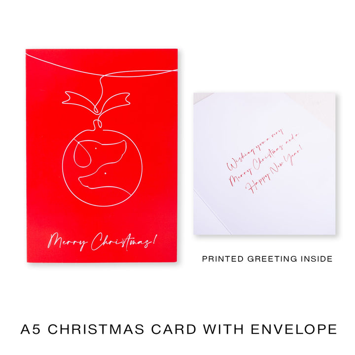 Red Christmas card with white design and envelope on a white background