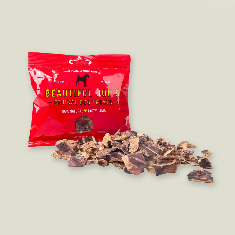 30g Packet of Beautiful Joe's Tasty Lamb Dog Treats with the dried lamb lung dog treats on a sage green background