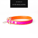 Hot pink and orange leather designer dog collar with silver buckle by Holly&Lil on a white background, and an 'As seen in Luxe Magazine' featured in the press badge.