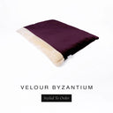 Luxury Dog Burrow Bag, a sleeping bag style or snuggle sack style dog bed, with a deep purple Velour outer cover and a plush cream faux-fur lining on a white backdrop.