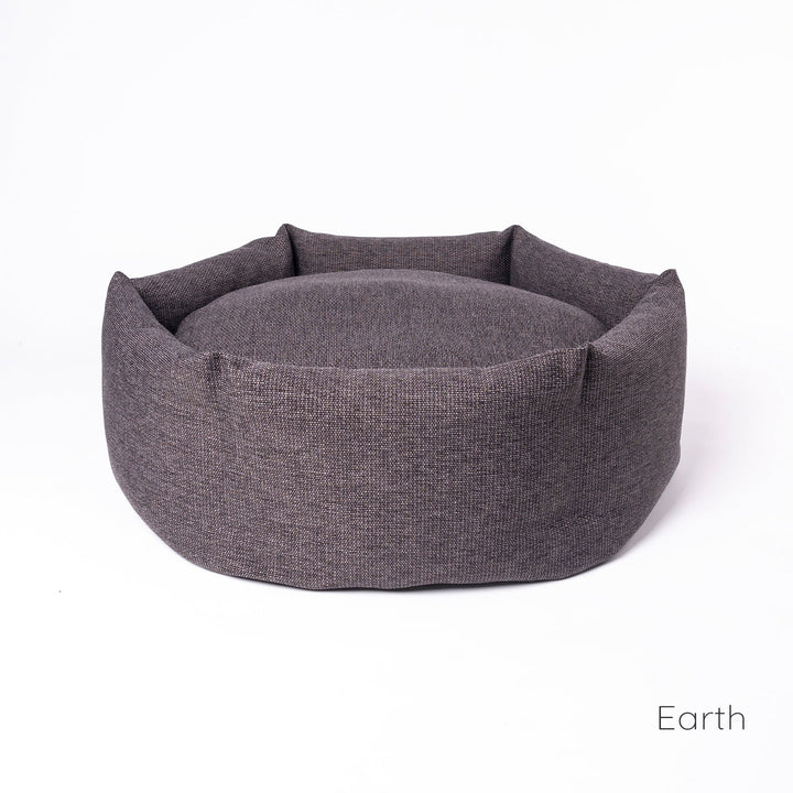 Luxury donut dog bed by designer Charley Chau - the Ducky Donut Dog Bed, shown here in a dark neutral, Earth.