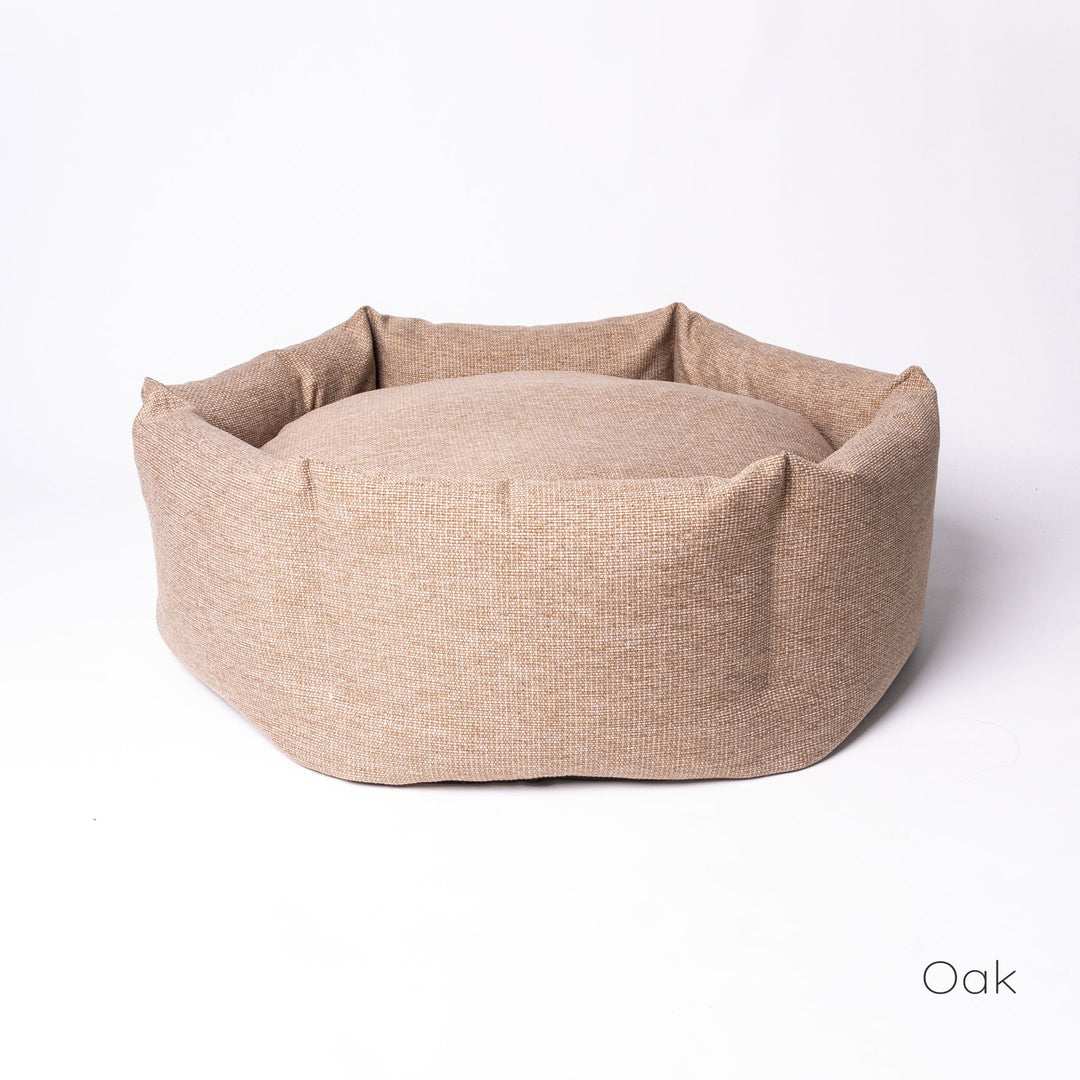 Luxury donut dog bed by designer Charley Chau - the Ducky Donut Dog Bed, shown here in a warm neutral Oak.
