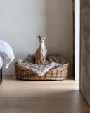 <em>Rattan Dog Baskets</em>