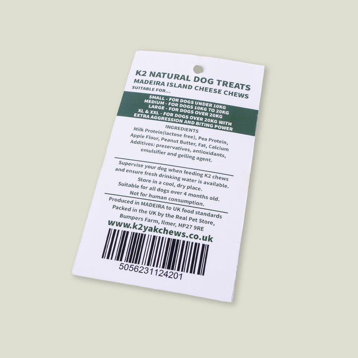 K2 Natural Dog Treats product label for a Madeira Island Cheese Dog Chew on a pale sage green background