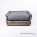 Luxury wicker dog bed - Charley Chau's Raised Rattan Dog Bed - with a deep-filled dog bed mattress in a meidum grey fabric called Faroe Nimbus Grey, placed on a white background.