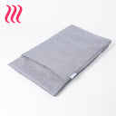 Folded spare snuggle dog bed cover in heron grey by Charley Chau on a white background.
