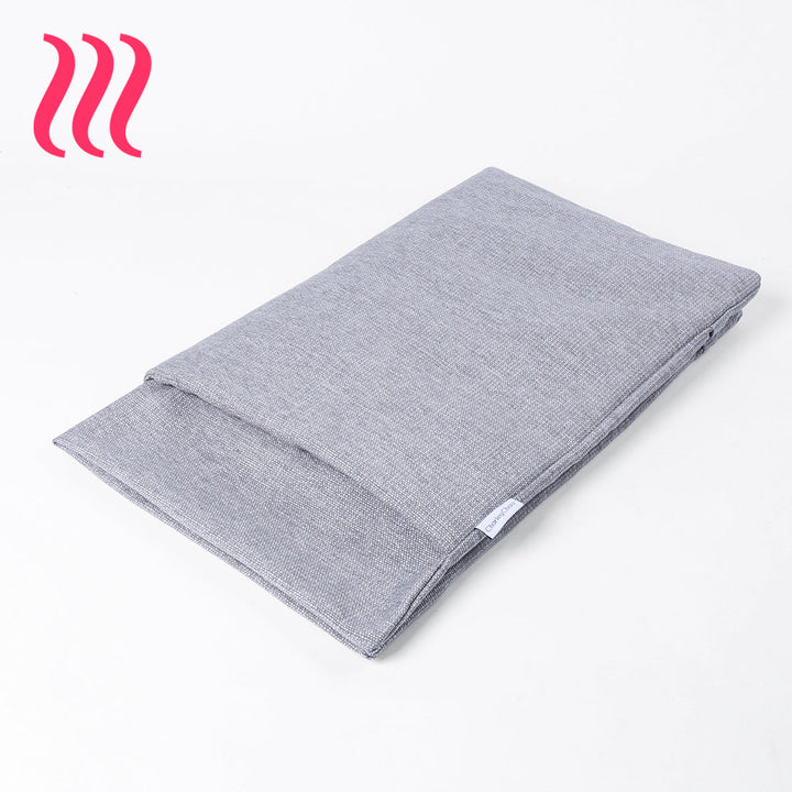Folded spare snuggle dog bed cover in heron grey by Charley Chau on a white background.