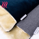 Close-up of Charley Chau spare luxury dog bed covers in dark blue velvet and a dark grey tweed with cream lining.