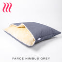 Luxury Dog Snuggle Bed, a sleeping bag style dog bed, with the outer cover in a mid grey upholstery fabric and cream faux-fur on the inside of the bed, on a white background.