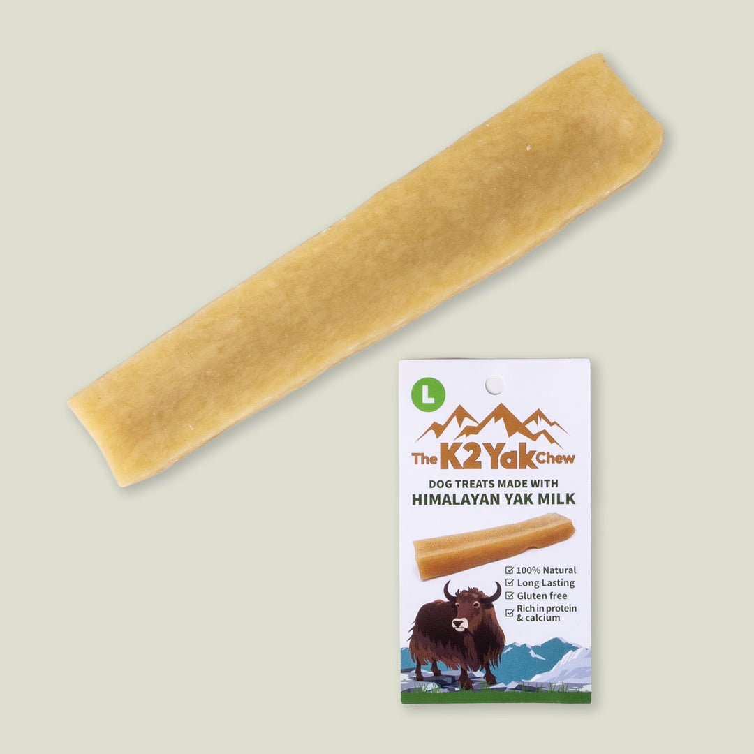 Dog Yak Chew Bar with a product label on a pale sage green background