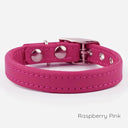 A Classic style dog collar made from calf leather shown in the colour Raspberry Pink on a white backdrop. Handmade to order. 