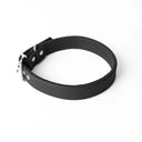 A handcrafted, bespoke black leather dog collar in a classic cut, made to order with finest quality Italian Calf Leather, to fit all breeds and sizes of dog, on a white background.