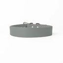A handcrafted, bespoke PALE GREY leather dog collar in a classic cut, made to order with finest quality Italian Calf Leather, to fit all breeds and sizes of dog, on a white background.