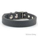 A Classic style dog collar made from calf leather shown in the colour School Grey on a white backdrop. Handmade to order. 