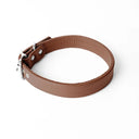 A handcrafted, bespoke brown leather dog collar in a classic cut, made to order with finest quality Italian Calf Leather, to fit all breeds and sizes of dog, on a white background.