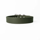A handcrafted, bespoke olve green leather dog collar in a classic cut, made to order with finest quality Italian Calf Leather, to fit all breeds and sizes of dog, on a white background.