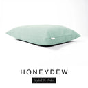 A luxury dog bed mattress in a pale sage green upholstery fabric with 'HONEYDEW' and a black 'Styled To Order' label on a white background; this machine washable dog bed mattress is designed for everyday comfort.