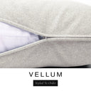 Close-up of a soft off-white cream machine washable dog bed mattress with its removable cover partially unzipped, revealing the deep-filled luxury dog bed mattress inside, above a white banner with the text 'VELLUM' and 'Styled To Order'.