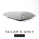 A luxury dog bed mattress in a classic mid grey upholstery fabric with 'TAILOR'S GREY' and a black 'Styled To Order' label on a white background; this machine washable dog bed mattress is designed for everyday comfort.