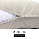 Close-up of a soft warm cream machine washable dog bed mattress with its removable cover partially unzipped, revealing the deep-filled luxury dog bed mattress inside, above a white banner with the text 'MUSLIN' and 'Styled To Order'.