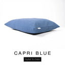 A luxury dog bed mattress in a rich denim blue upholstery fabric with 'CAPRI BLUE' and a black 'Styled To Order' label on a white background; this machine washable dog bed mattress is designed for everyday comfort.
