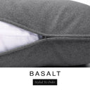 Close-up of a dark charcoal grey machine washable dog bed mattress with its removable cover partially unzipped, revealing the deep-filled luxury dog bed mattress inside, above a white banner with the text 'BASALT' and 'Styled To Order'.