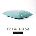 A luxury dog bed mattress in a soft powder blue upholstery fabric with 'ROBIN'S EGG' and a black 'Styled To Order' label on a white background; this machine washable dog bed mattress is designed for everyday comfort.