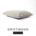 A luxury dog bed mattress in a warm sandy taupe upholstery fabric with 'DRIFTWOOD' and a black 'Styled To Order' label on a white background; this machine washable dog bed mattress is designed for everyday comfort.