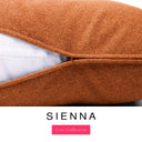Close-up of a warm burnt orange machine washable dog bed mattress with its removable cover partially unzipped, revealing the deep-filled luxury dog bed mattress inside, above a white banner with the text 'SIENNA' and 'Core Collection'.