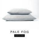 Two luxury dog bed mattresses in a soft pale grey upholstery fabric stacked on top of each other, with 'PALE FOG' and a black 'Styled To Order' label on a white background; these machine washable dog bed mattresses are made for lasting comfort and easy care.