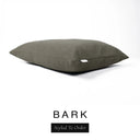 A luxury dog bed mattress in a deep olive brown upholstery fabric with 'BARK' and a black 'Styled To Order' label on a white background; this machine washable dog bed mattress is designed for everyday comfort.