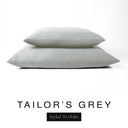 Two luxury dog bed mattresses in a classic mid grey upholstery fabric stacked on top of each other, with 'TAILOR'S GREY' and a black 'Styled To Order' label on a white background; these machine washable dog bed mattresses are made for lasting comfort and easy care.