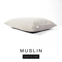 A luxury dog bed mattress in a soft warm cream upholstery fabric with 'MUSLIN' and a black 'Styled To Order' label on a white background; this machine washable dog bed mattress is designed for everyday comfort.