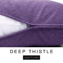 Close-up of a rich deep purple machine washable dog bed mattress with its removable cover partially unzipped, revealing the deep-filled luxury dog bed mattress inside, above a white banner with the text 'DEEP THISTLE' and 'Styled To Order'.