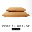 Two luxury dog bed mattresses in a warm amber orange upholstery fabric stacked on top of each other, with 'PERSIAN ORANGE' and a black 'Styled To Order' label on a white background; these machine washable dog bed mattresses are made for lasting comfort and easy care.