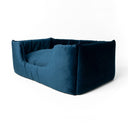 The Deeply Dishy Dog Bed  by Charley Chau in dark blue velvet with high-sides and a deep-filled luxury dog bed mattress.