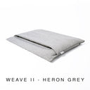 Luxury dog burrow bag, a sleeping bag style dog bed, in a woven grey upholstery fabric, labelled with "Weave II - Heron Grey" text.