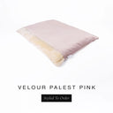 A luxurious Dog Burrow Bag, a sleeping bag style dog bed or snuggle sack style dog bed, with an outer cover in palest pink upholstery-quality Velour with a plush, cream faux-fur lining, and a badge with the colour name Palest Pink on a white background.