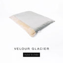 A luxurious Dog Burrow Bag, a sleeping bag style dog bed or snuggle sack style dog bed, with an outer cover in pale icy grey upholstery-quality Velour with a plush, cream faux-fur lining, and a badge with the colour name Glacier on a white background.