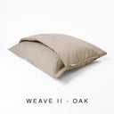 Luxury Dog Snuggle Bed, a cave bed style dog bed with a soft supoprtive mattress and a built-in blanket cover, made to last in a beige scrabble resistant upholstery fabric, on a white background.