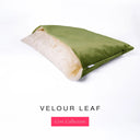 Charley Chau's luxury Dog Snuggle Bed, a cave bed style dog bed or burrow bed, with an outer cover in olive green upholstery-quality Velour with a plush, cream faux-fur lining, on a white background.