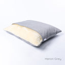 Dog cave luxury Dog Snuggle Bed by Charley Chau in a grey woven upholstery fabric with plush cream lining on a white backdrop.
