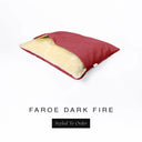 A Charley Chau Snuggle Bed, a cave bed or sleeping bag style dog bed made with a dark red woven upholstery-quality fabric with cream, plush, faux-fur lining on a white backdrop.