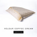 A luxury Dog Snuggle Bed, a cave bed style dog bed or sleeping bag dog bed, in upholstery-quality beige Velour with a cream plush lining on a white backdrop.
