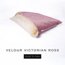 A luxury Dog Snuggle Bed, a cave bed style dog bed or sleeping bag dog bed, in upholstery-quality dusty rose pink Velour with a cream plush lining on a white backdrop.