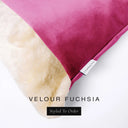 Close up of the corner of a luxury Dog Snuggle Bed, a cave bed style dog bed or sleeping bag style dog bed, with a bright fuchsia pink upholstery-quality velour / velvet outer cover and plush cream faux-fur lining, showing a Charley Chau designer brand label on the dog bed, on a white background.