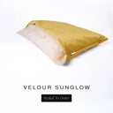 A luxury Dog Snuggle Bed, a cave bed style dog bed or sleeping bag dog bed, in upholstery-quality golden yellow Velour with a cream plush lining on a white backdrop.